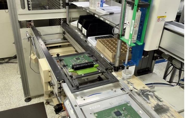 Automated RTV dispense cell with in-process verification