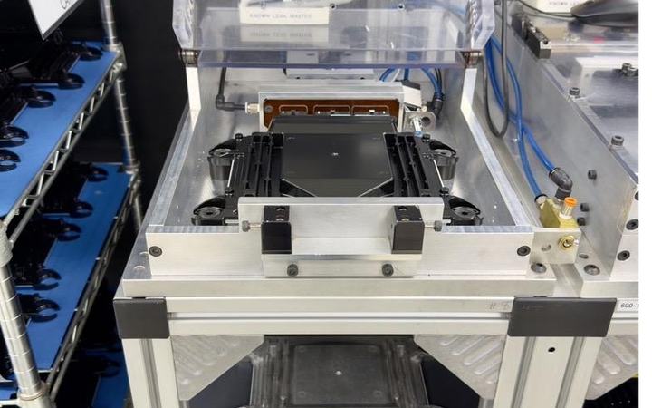 Control module fixtured on a leak test station